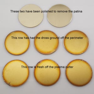 May include: Nine brass discs in a variety of finishes are displayed. Two are polished, three have had the dross ground off the perimeter, and the remaining four are fresh off the plasma cutter. Text on the image describes the different finishes.