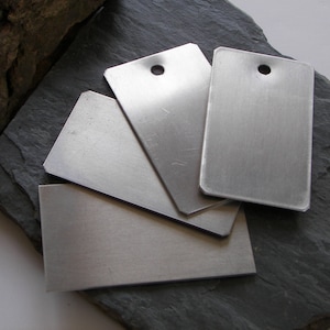 Stainless Steel 20 ga. Luggage Tags (5-250) 2&quot; x 3.5 &quot; #4 finish (shiny with a grain) stainless with holes punched, corner & edges worked