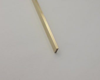 Brass for inlays 1/8" x 1/8" or 1/8" x 1/4" polished brass rod.  These are 6" long-ask for other lengths