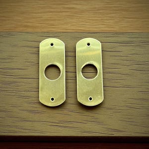 Placas de soporte de latón para tiradores de gabinetes: 3/4" x 2", calibre 16 (juego de 2)