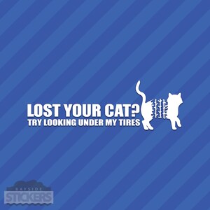 May include: White vinyl sticker with a cat silhouette and the text "Lost your cat? Try looking under my tires".