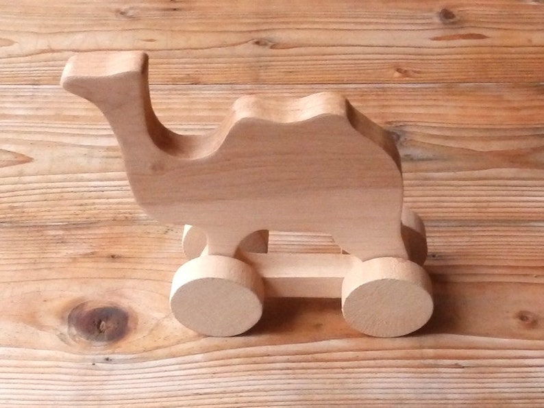 Wooden toys on wheels Camel