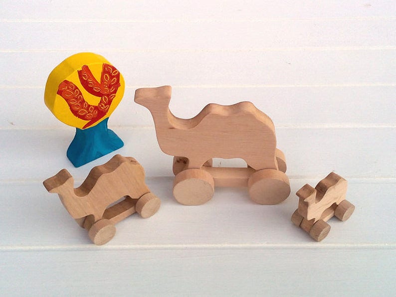 Wooden toys on wheels Camel