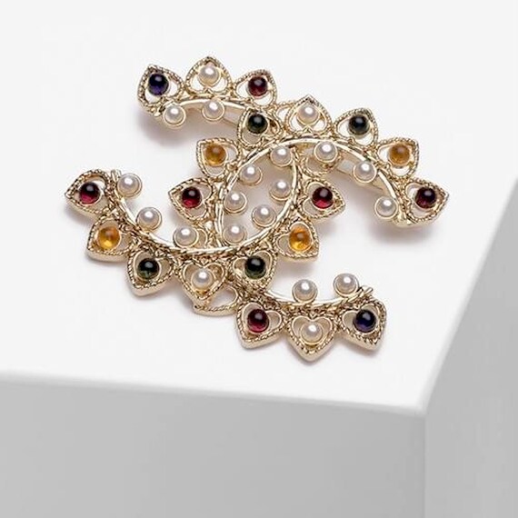 CHANEL GRIPOIX brooch | Chanel logo brooch | Signe