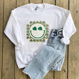 White Green Shamrock Smiley Face St. Patty’s Day St. Patrick’s Day Sequin Chenille Patch White Crewneck Sweatshirt Pullover Tee