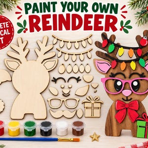 May include: A paint your own reindeer craft kit featuring unfinished wooden reindeer shapes, assorted decorative pieces like glasses, bows, and presents, a string of lights, a paintbrush, and six small pots of colored paint for customization.