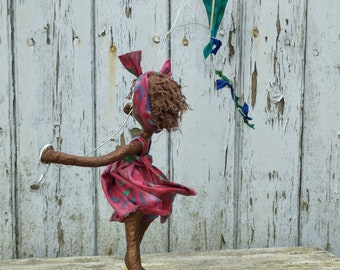 Kite Flyer Sculpture -  Girl with kite. Paverpol Sculpture. Made to order