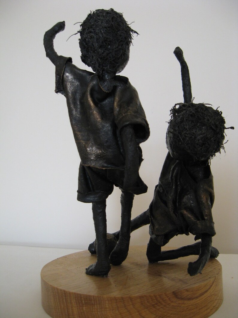 Sculpture of boys playing football Sculpture of footballer Little Footballers Made to order