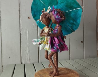 Escultura infantil de Paverpol con paraguas: Arte de la amistad, hecha por encargo.