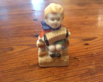 Vintage Boy With Accordian Porcelain Figurine. Made in Japan.