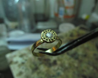 Engagement ring. 14K yellow gold ring with 0.16ct' White Diamond and 0.14ct Black Diamond.