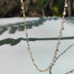 Gold Moissanite necklace. 14k solid gold necklace with White Moissanite. Wedding necklace. A wonderful gift.