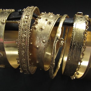Bracelets. A beautiful selection of gold, silver, and gold plated handmade bracelets. A promotional page only!!!
