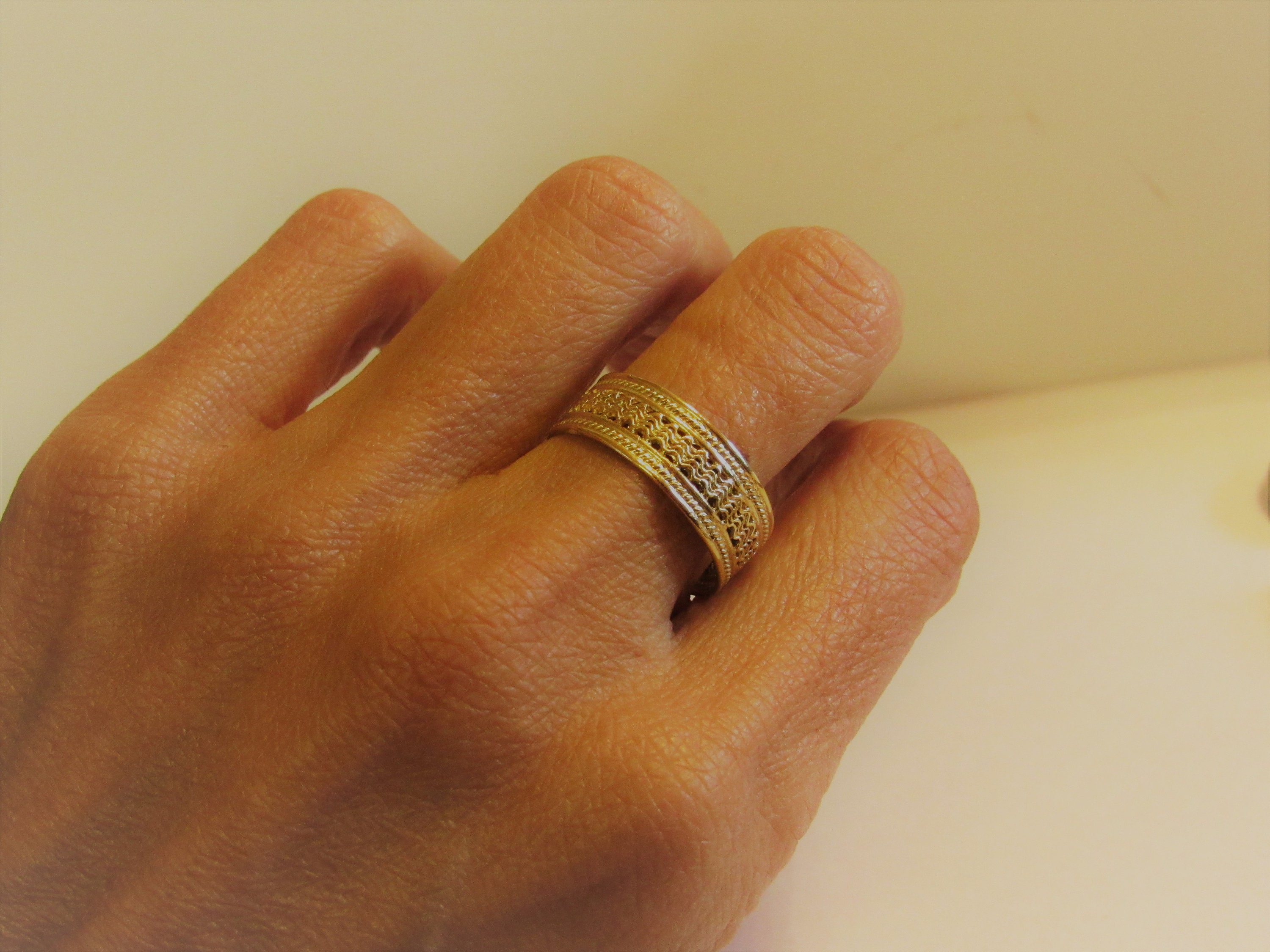 Filigree gold band deals