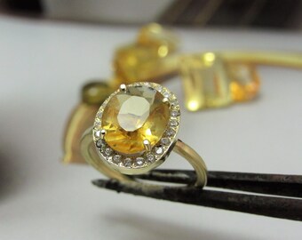 Engagement ring. Beautiful 14K yellow gold ring with Citrine stone and 0.22ct white diamonds.