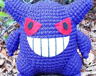 Peluche de monstruo morado de 25 cm