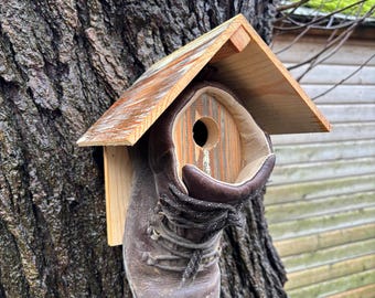 Handmade Garden birds nest box made from a repurposed hiking boot and reclaimed pine wood. suitable for small birds Sparrows and Blue Tits