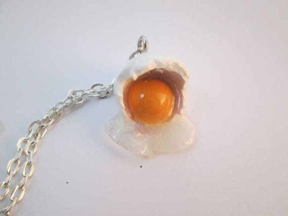 Miniature food jewelry, cracked egg necklace