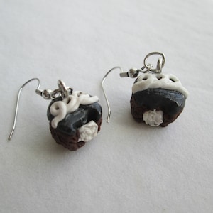 Miniature food jewelry Chocolate creme filled cupcake earrings.