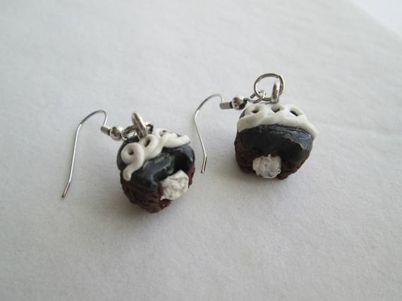 Miniature food jewelry Chocolate creme filled cupcake earrings.