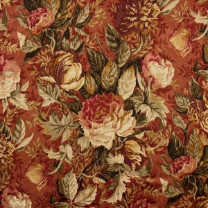 May include: A fabric featuring a dense floral pattern with large, layered blossoms in shades of deep red, cream, and muted gold. The design includes intricate green and brown foliage set against a rich, solid terracotta-colored background.