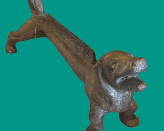 Vintage Dog Scrapper, Cast Iron from the 30’s