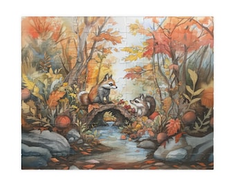 May include: A watercolor painting of a fox and a raccoon standing on a bridge over a stream in a forest. The forest is filled with autumn leaves in shades of red, orange, and yellow. The animals are looking at each other.