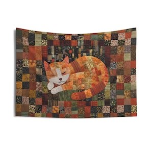 May include: A rectangular wall tapestry featuring a patchwork quilt design composed of numerous small squares in shades of orange, brown, green, and black. Centered on the quilt is a large, stylised sleeping cat made of orange patterned fabric.