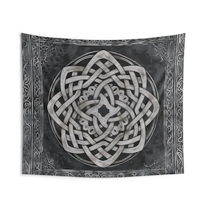 May include: A black and white tapestry featuring a silver Celtic knot design. The knot is positioned in the centre of the tapestry and is encircled by a border of smaller Celtic knots.