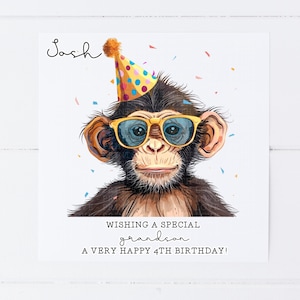 May include: A birthday card featuring a cartoon chimpanzee wearing a party hat and sunglasses. The card says "Wishing a special grandson a very happy 4th birthday!"
