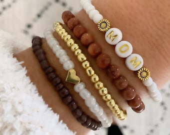 Personalized Beaded Name Bracelet: Sunflower Accent, Stackable Custom Word Jewelry