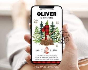 May include: A digital invitation for a 1st birthday party with a woodland theme. The invitation features a red and black checked number one, an axe, a lantern, and a forest background. The text on the invitation reads "Let's Celebrate! Oliver is turning 1. Jan. 11 2-5PM. The Davidson Residence 123 Pine Tree Rd. Denver Co. RSVP with Oliver's Mom at 231.535.4896. Cavadesign.etsy.com".