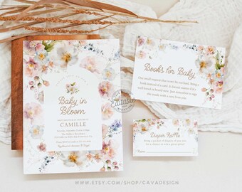 May include: A floral baby shower invitation with a watercolour design. The invitation reads "Baby in Bloom" and includes the name "Camille". The invitation also includes details about the baby shower, such as the date, time, and location. There are two additional cards with the text "Books for Baby" and "Diaper Raffle".