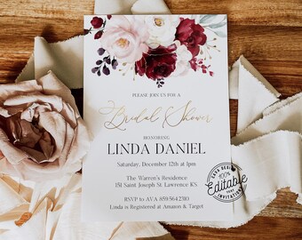 May include: A white bridal shower invitation with a floral design in shades of pink, burgundy, and white. The text reads "Please join us for a Bridal Shower honoring Linda Daniel. Saturday, December 12th at 1pm. The Warren's Residence 151 Saint Joseph St. Lawrence KS. RSVP to AVA 859.564.2310. Linda is Registered at Amazon & Target."