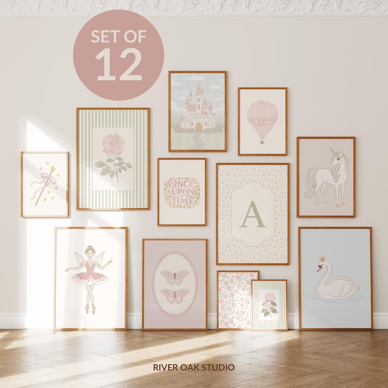 May include: Set of 12 framed art prints with a fairytale theme. The prints feature illustrations of a castle, hot air balloon, unicorn, fairy, swan, and floral designs in soft pastel colors. The text "ONCE UPON A TIME" is also included.