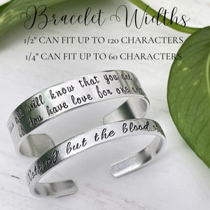 May include: Two silver bracelets with engraved text. The larger bracelet is 1/2 inch wide and can fit up to 120 characters. The smaller bracelet is 1/4 inch wide and can fit up to 60 characters. The text on the larger bracelet reads "This all will know that you are if you have love for one another". The text on the smaller bracelet reads "Nothing but the blood of".