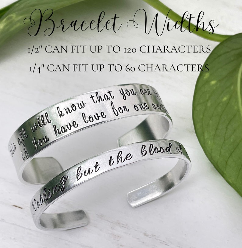 May include: Two silver bracelets with engraved text. The larger bracelet is 1/2 inch wide and can fit up to 120 characters. The smaller bracelet is 1/4 inch wide and can fit up to 60 characters. The text on the larger bracelet reads "This all will know that you are if you have love for one another". The text on the smaller bracelet reads "Nothing but the blood of".