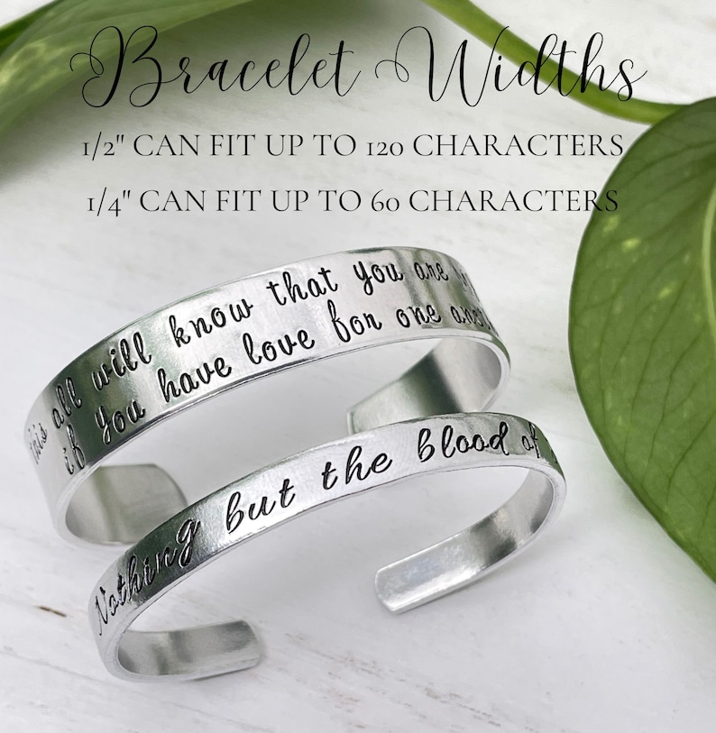 May include: Two silver bracelets with engraved text. The larger bracelet is 1/2 inch wide and can fit up to 120 characters. The smaller bracelet is 1/4 inch wide and can fit up to 60 characters. The text on the larger bracelet reads "This all will know that you are if you have love for one another". The text on the smaller bracelet reads "Nothing but the blood of".
