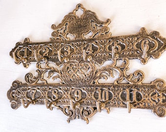 Vintage cast iron hotel number wall hooks hanger