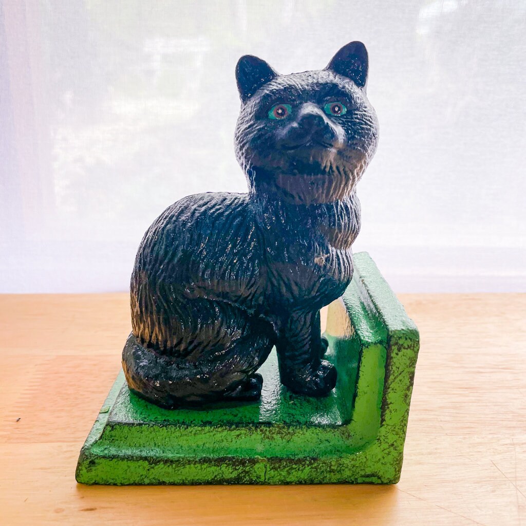 Black cat bookends 2025