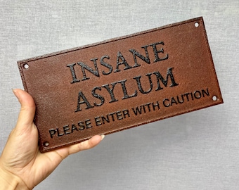 Vintage insane asylum rusted cast iron hanging wall sign - door sign