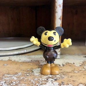 Vintage disney mickey mouse cast iron statue