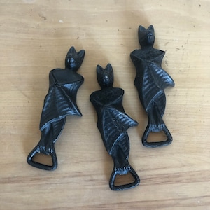 Vintage Dracula bat cast iron bottle opener