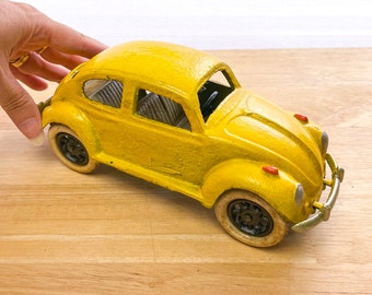 Large cast iron vintage VW beetle car statue / yellow bug car / herbie love bug