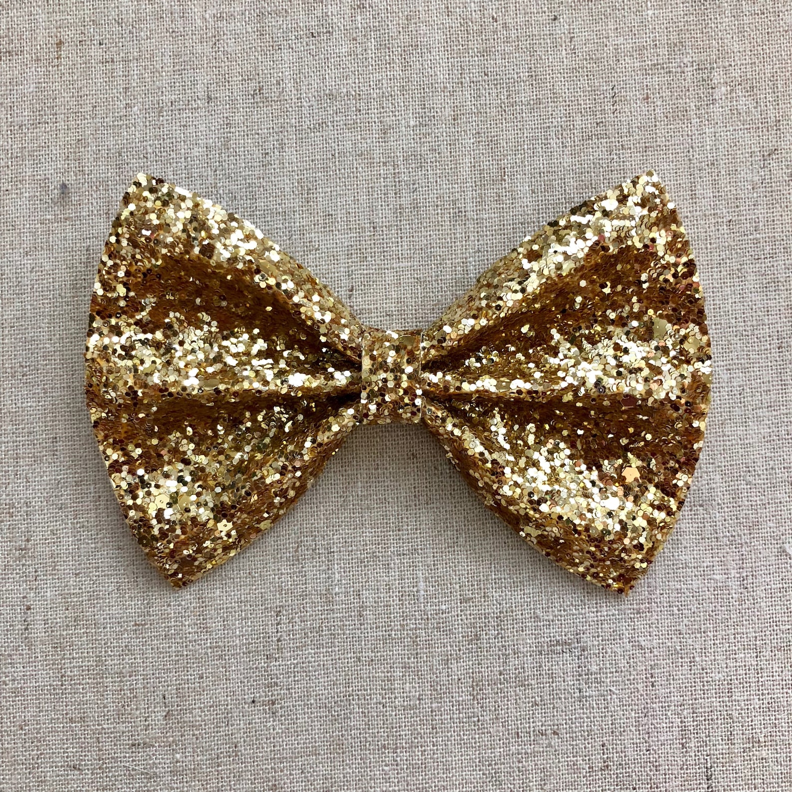 sparkly gold bow tie