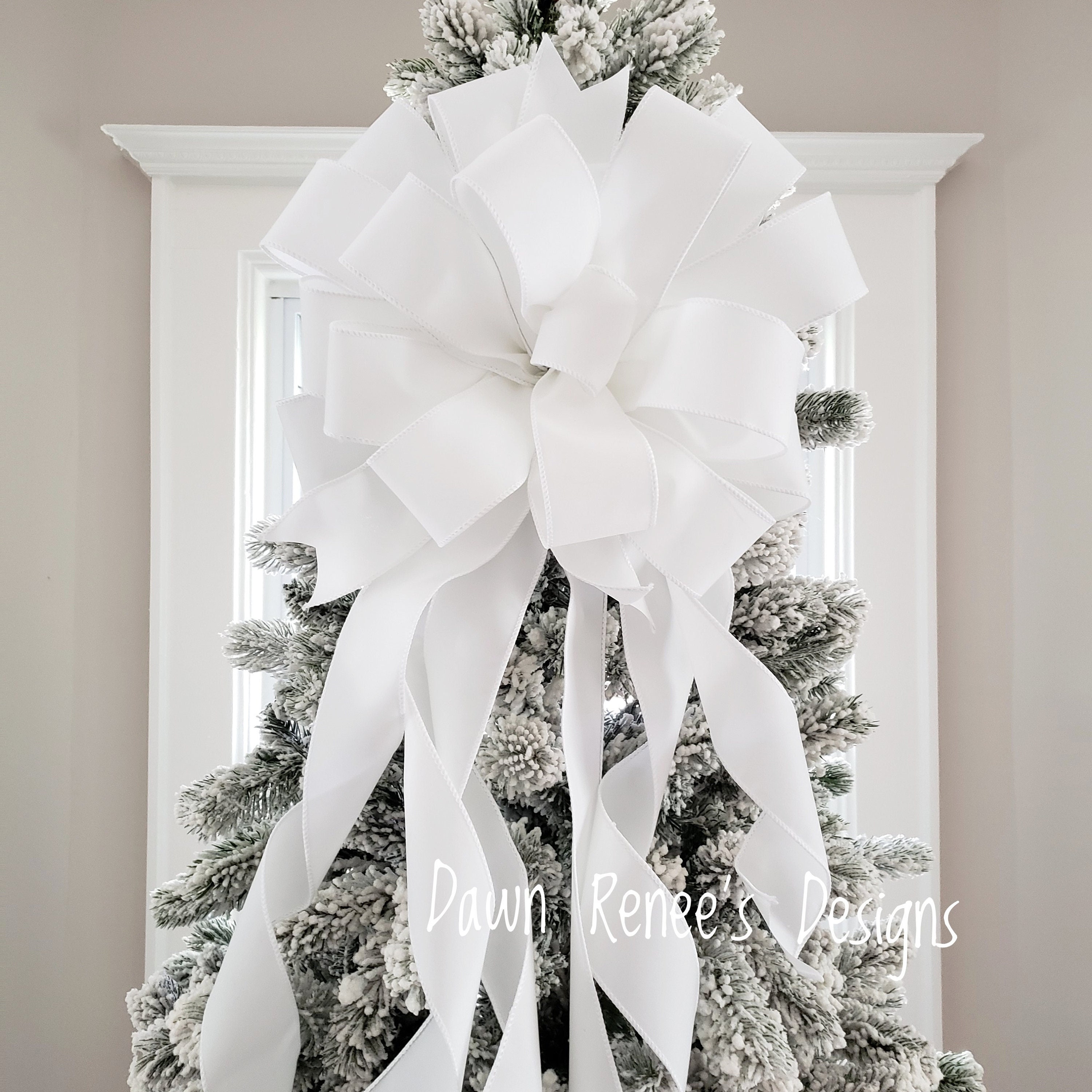 The Mariah red and white Christmas tree topper bow-bow with long