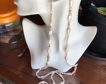 Ref. 197 Long pink and cream hand-knottedVintage baroque,  flat rectangular freshwater pearl necklace.