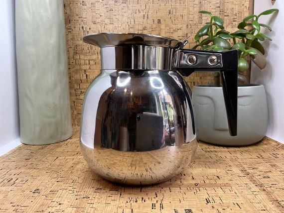 Mid Century Stainless Steel 3 Pint Coffee Pot With Hinged Lid and Black Handle.