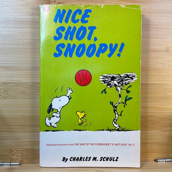 Vintage 1988 Peanuts ‘Nice Shot, Snoopy’ by Charles M. Schulz / No. 79 / Charlie Brown / Cartoon Strip / Collectable Series / Paperback