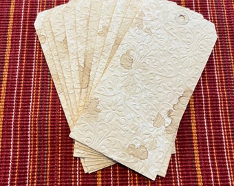 Coffee Dyed and Embossed Tags for Gifts, Journals or mixed media projects.